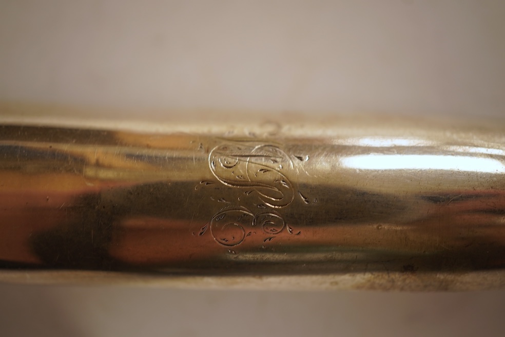 A George II silver marrow scoop, maker's mark rubbed, London, 1743, 21.3cm.